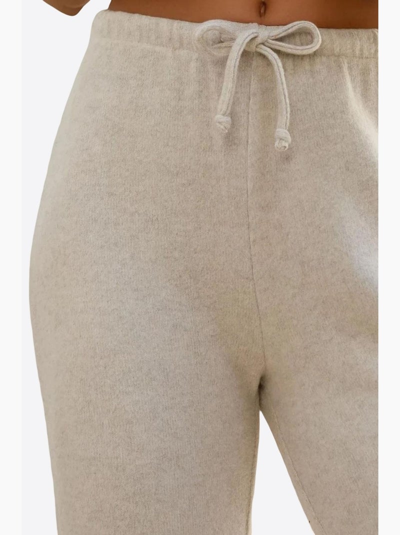 Calças de malha macia texturizada com cordões hiccup Creme - Kiabi