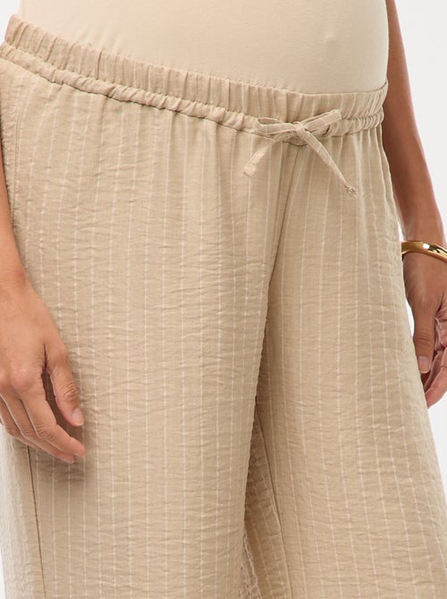 Calças de maternidade largas às riscas - Kiabi