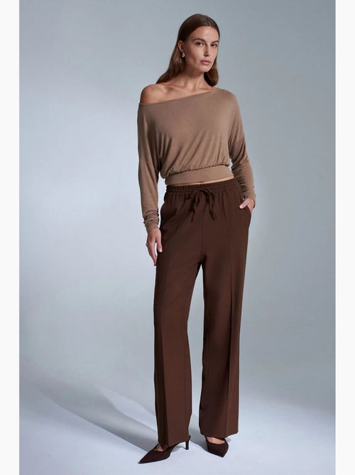 Calças de mulher em crepe de perna reta dilvin - Kiabi Calças de mulher em crepe de perna reta dilvin - Kiabi