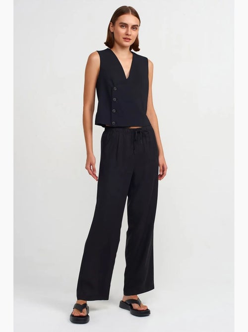 Calças de mulher em tencel de perna larga com cintura com cordão dilvin - Kiabi Calças de mulher em tencel de perna larga com cintura com cordão dilvin - Kiabi
