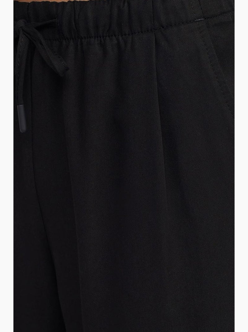Calças de mulher em tencel de perna larga com cintura com cordão dilvin Preto - Kiabi