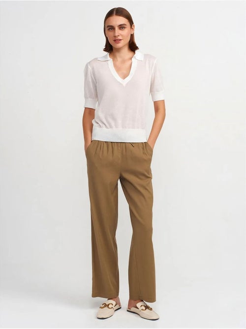 Calças de mulher em tencel de perna larga com cintura com cordão dilvin - Kiabi Calças de mulher em tencel de perna larga com cintura com cordão dilvin - Kiabi