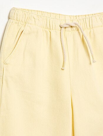 Calças de sarja com cordões de ajuste