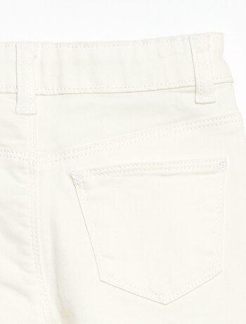 Calças de sarja que abrem com molas de pressão