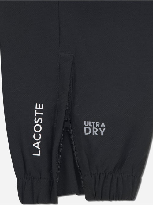 Calças de treino com cintura elástica - lacoste - Kiabi Calças de treino com cintura elástica - lacoste - Kiabi