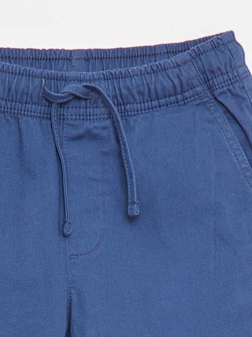 Calças elásticas com vários bolsos - Kiabi