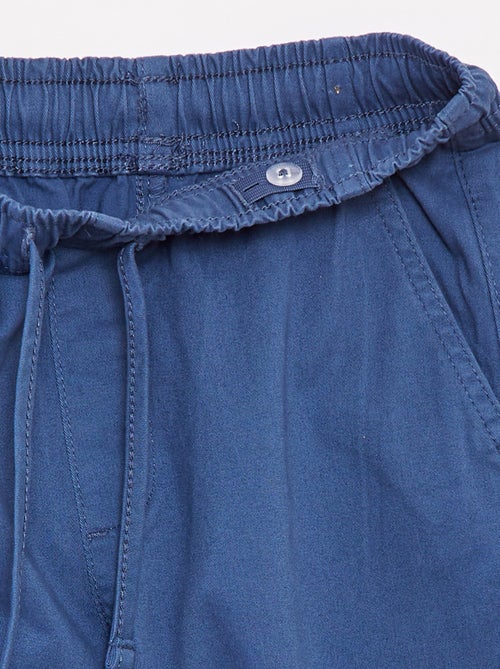 Calças elásticas com vários bolsos - Kiabi