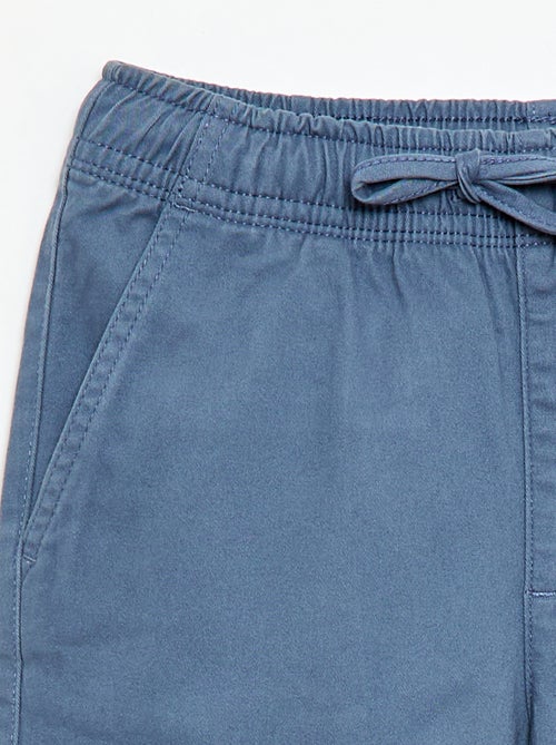 Calças elásticas com vários bolsos - Kiabi