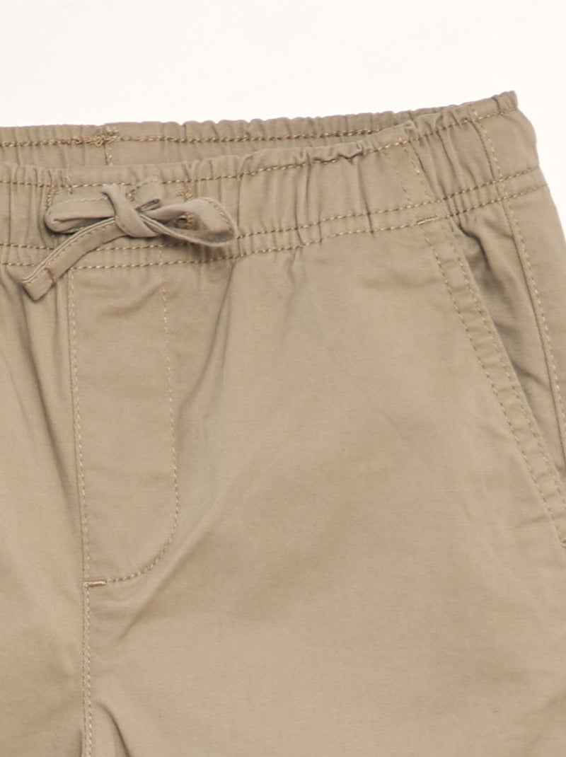 Calças elásticas com vários bolsos BEGE - Kiabi