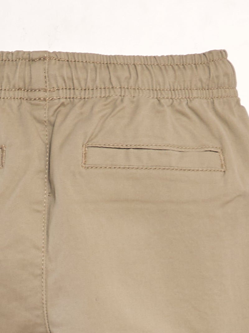 Calças elásticas com vários bolsos BEGE - Kiabi