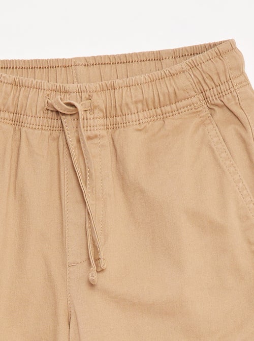 Calças elásticas com vários bolsos - Kiabi