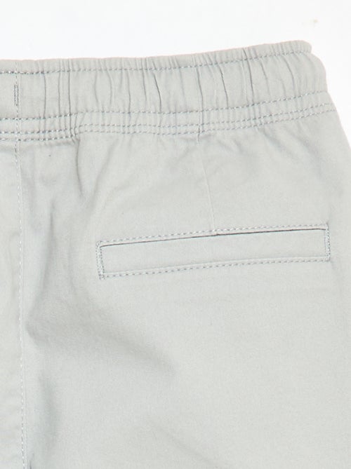 Calças elásticas com vários bolsos - Kiabi