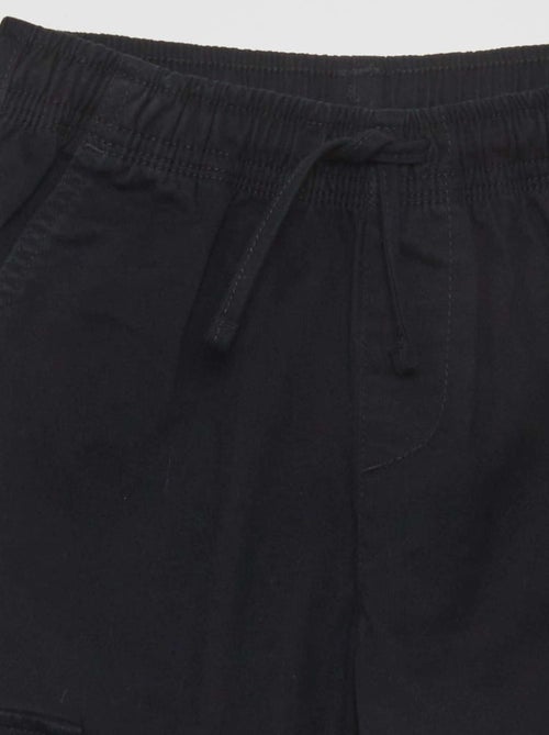 Calças elásticas com vários bolsos - Kiabi