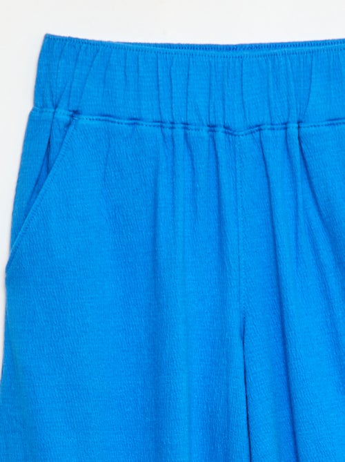 Calças em malha amassada de algodão - Kiabi