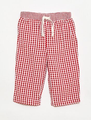 Calças em malha canelada com cintura elástica