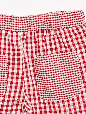 Calças em malha canelada com cintura elástica