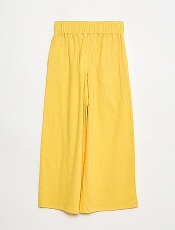 Calças em malha franzida de algodão