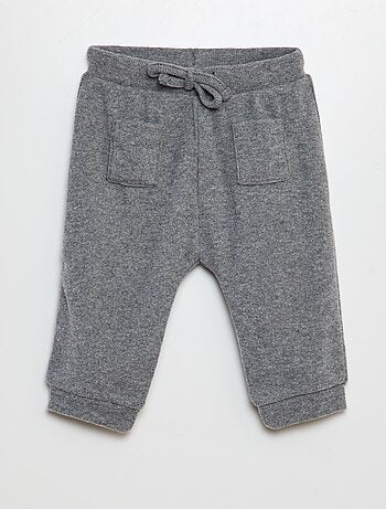 Calças em malha peluche