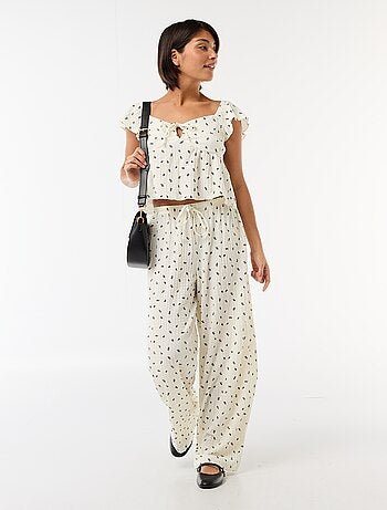 Calças estampadas em malha crinkle