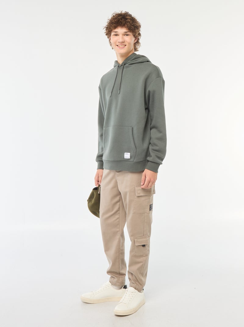 Calças estilo 'jogger' com vários bolsos Bege - Kiabi