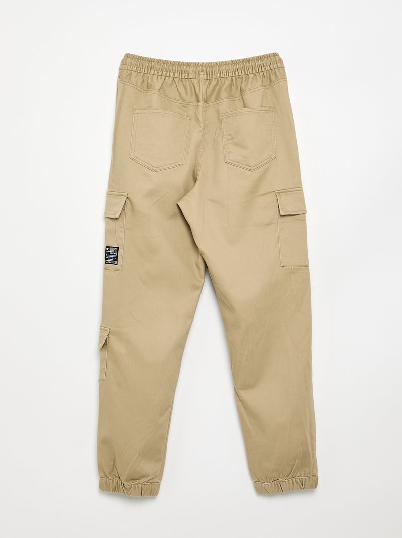 Calças estilo 'jogger' com vários bolsos Bege - Kiabi