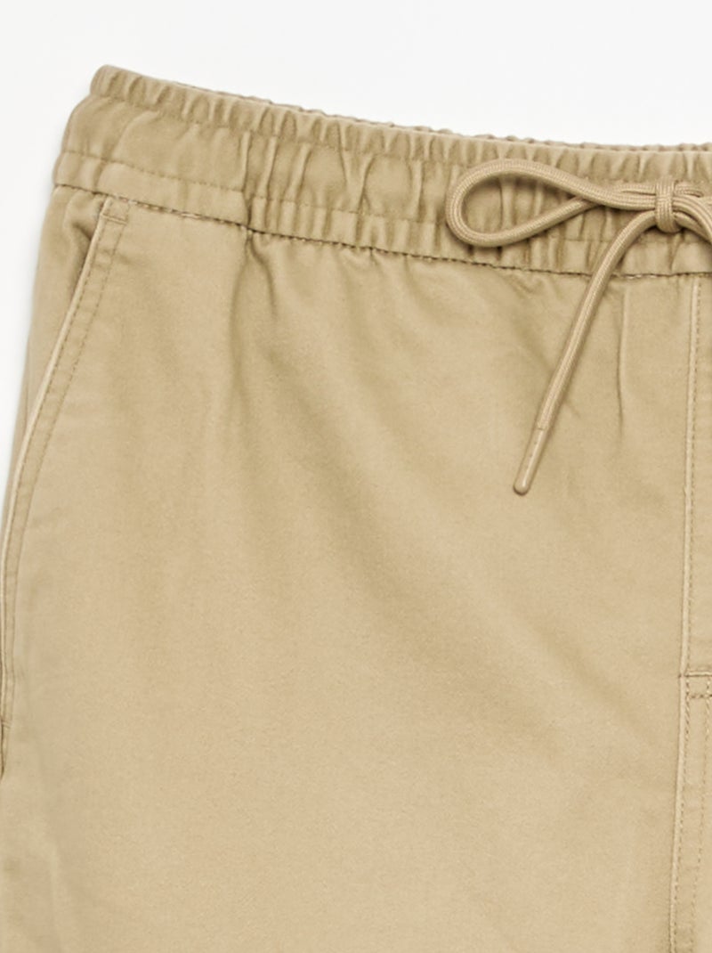 Calças estilo 'jogger' com vários bolsos Bege - Kiabi