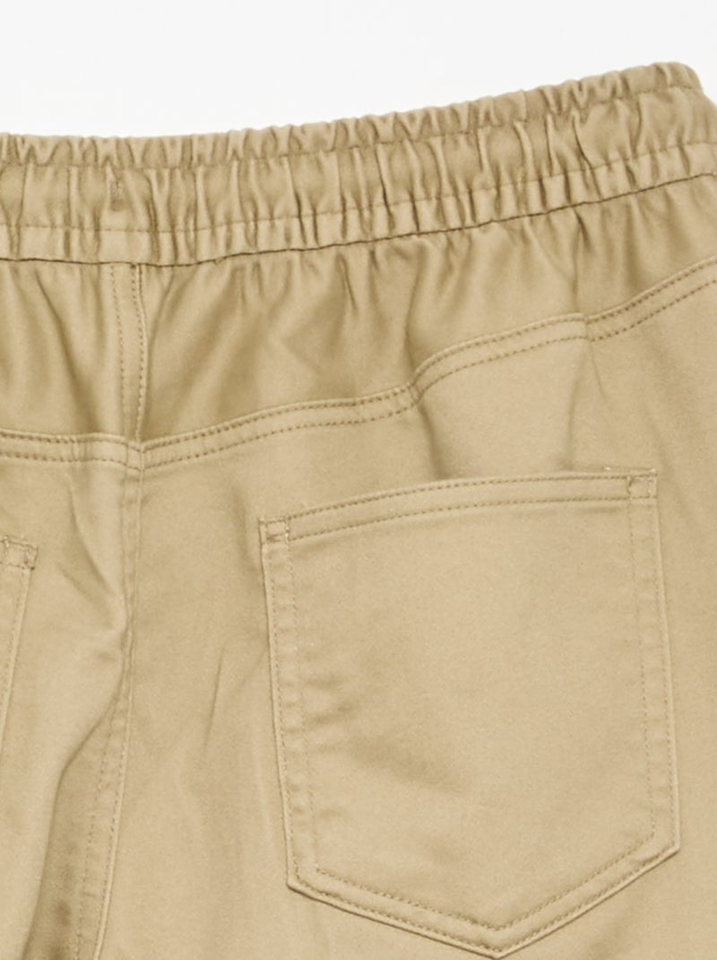 Calças estilo 'jogger' com vários bolsos Bege - Kiabi