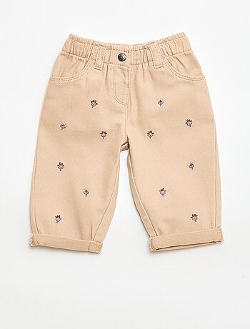 Calças estilo paperbag com bordado de 'flores'