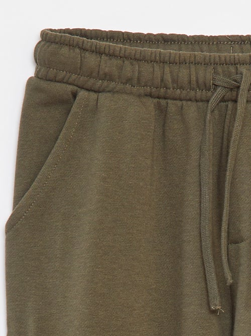 Calças
 fato de treino com vários bolsos em moletão - Kiabi