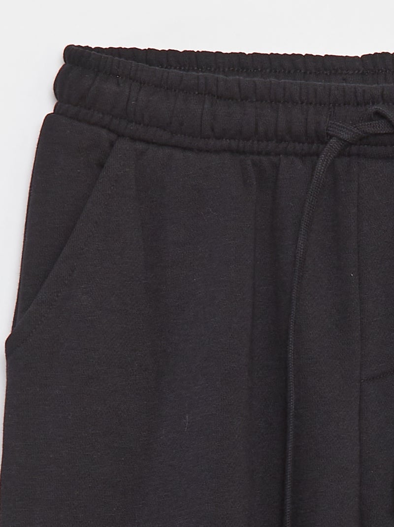 Calças
 fato de treino com vários bolsos em moletão Preto - Kiabi