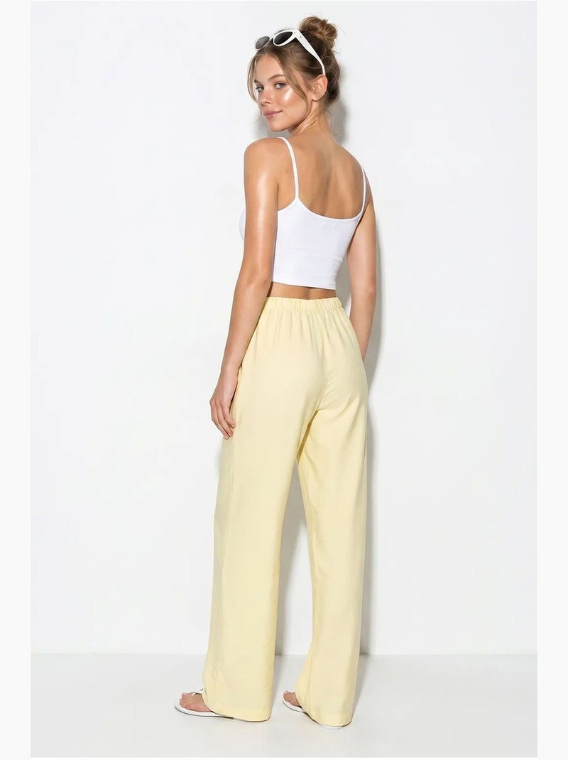 Calças femininas de crepe de perna larga lucci Amarelo-limão - Kiabi