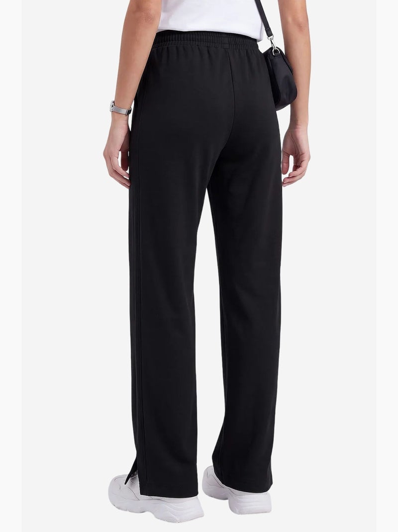 Calças femininas sem fecho tommy Preto - Kiabi