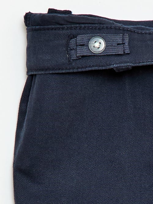 Calças flare - Corte + ajustado - Kiabi