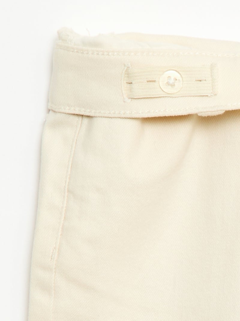 Calças flare - Corte + ajustado Branco - Kiabi