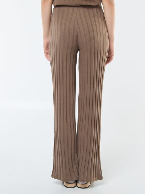 Calças flare de malha - Kiabi