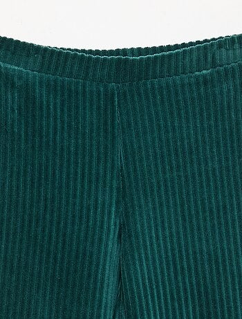 Calças flare em veludo cotelê