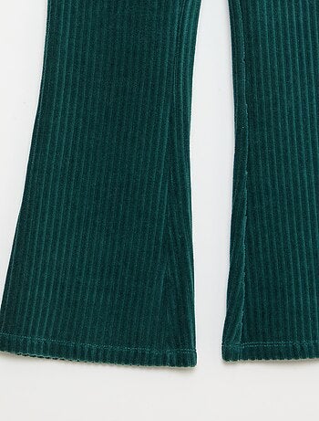 Calças flare em veludo cotelê