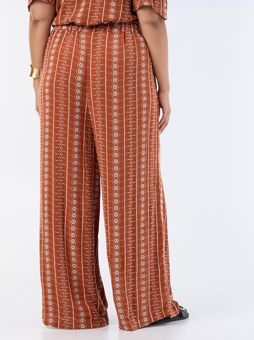 Calças fluidas com bordados - Kiabi