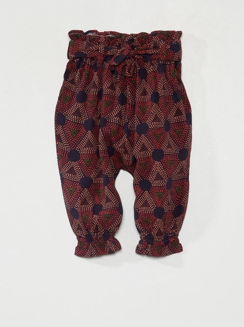 Calças fluidas com estampado - Kiabi