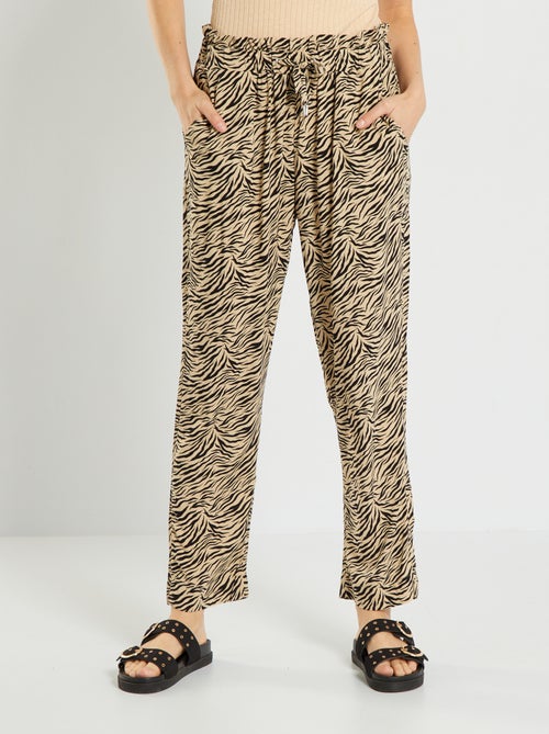 Calças fluidas com estampado - Kiabi