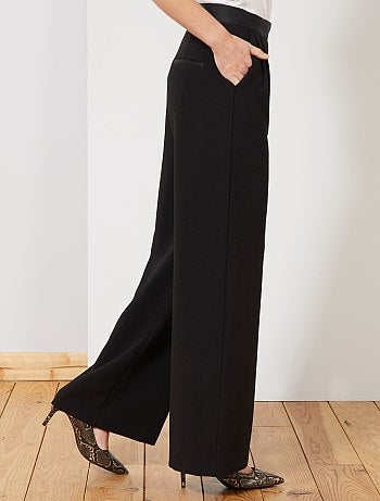 Calças fluidas com pinças - Kiabi