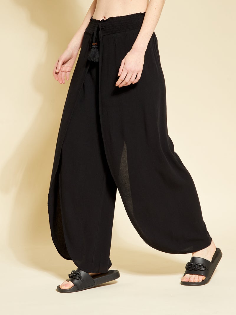 Calças fluidas em malha crepe Preto - Kiabi