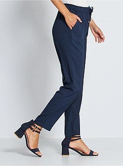 Calças fluidas estampadas - Kiabi