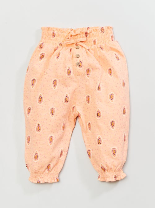 Calças fluidas estampadas - Kiabi