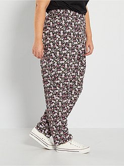 Calças fluidas 'floridas' - Kiabi