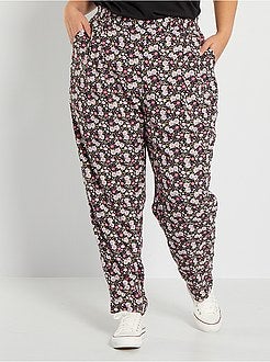 Calças fluidas 'floridas' - Kiabi