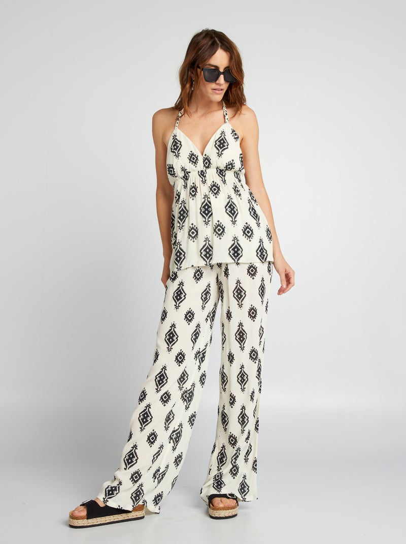 Calças fluidas largas com estampado BRANCO - Kiabi
