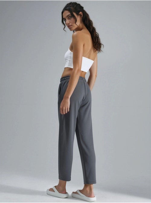 Calças jogger carrot fit com cintura elástica toque de modal, hiccup - Kiabi Calças jogger carrot fit com cintura elástica toque de modal, hiccup - Kiabi