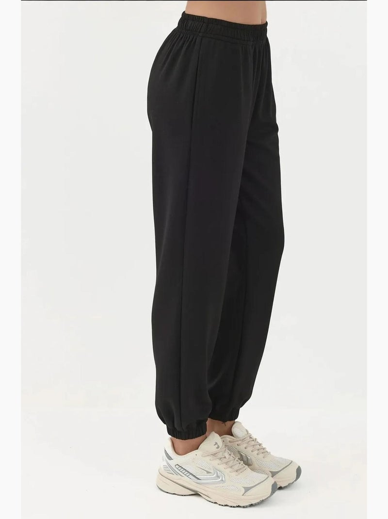 Calças jogger com cintura elástica e toque de modal hiccup Preto - Kiabi