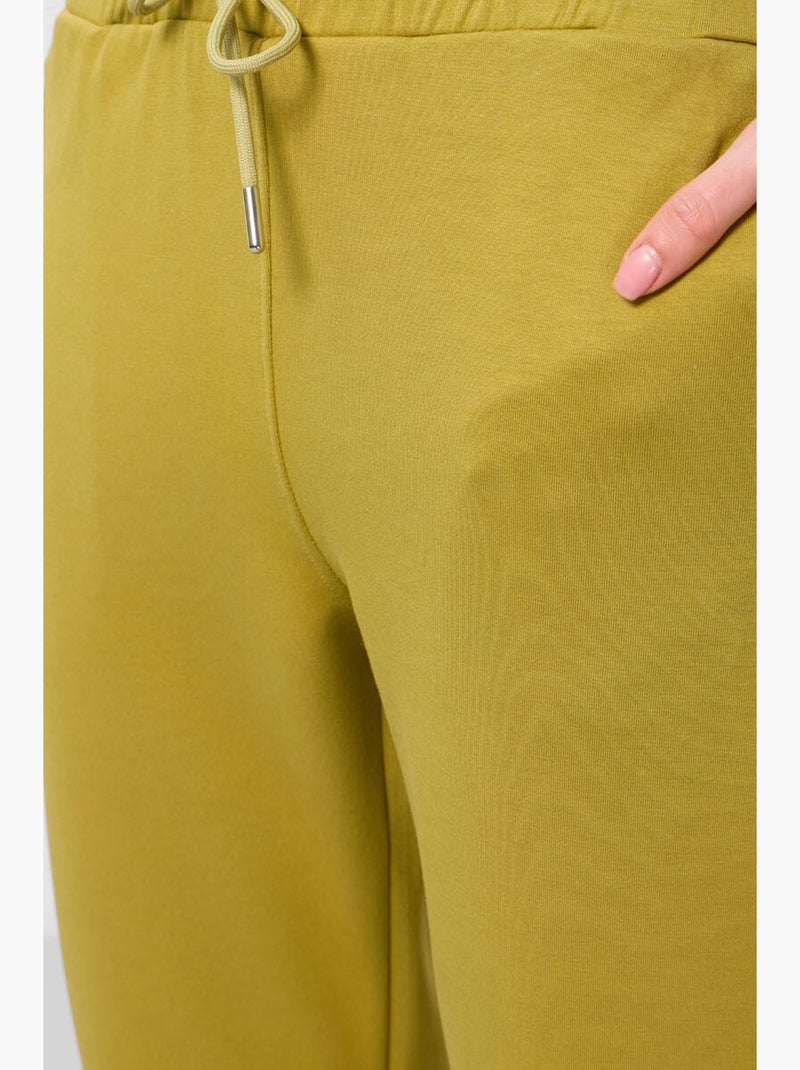Calças jogger de mulher com fecho de correr tommy Cáqui - Kiabi